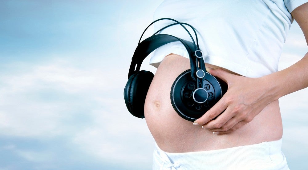 Happiness pregnant women in the white